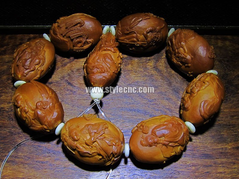 數控雕刻機雕刻下橄欖核