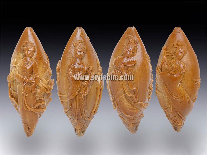 數控雕刻機對劣質橄欖核進行雕刻